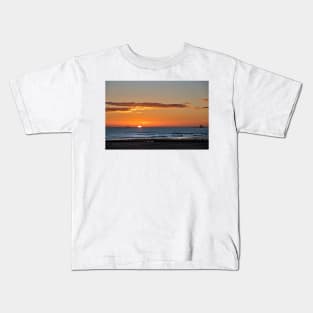 Sunrise over a tranquil North Sea Kids T-Shirt